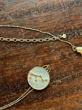 Tai Virgo mother of pearl pendant with fine chain